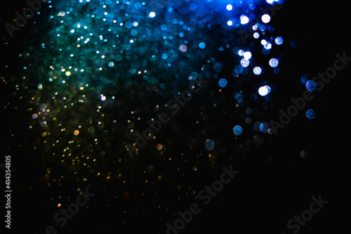 Glittering stars of blur blue bokeh