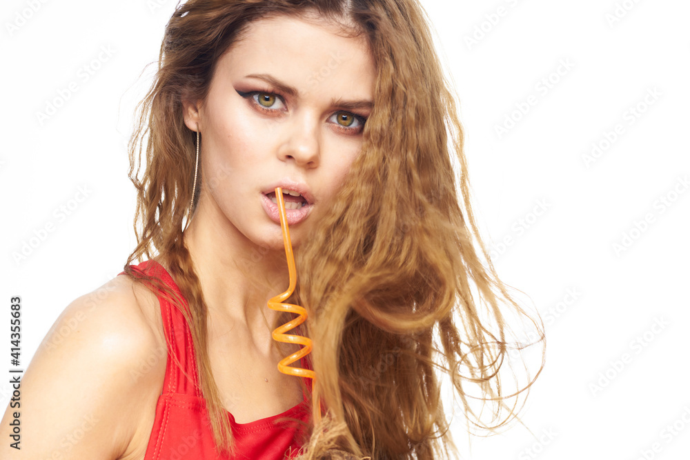 Pretty woman red tank top wavy hair attractive look hotel lifestyle light background Pretty woman red tank top wavy hair attractive look hotel lifestyle light background