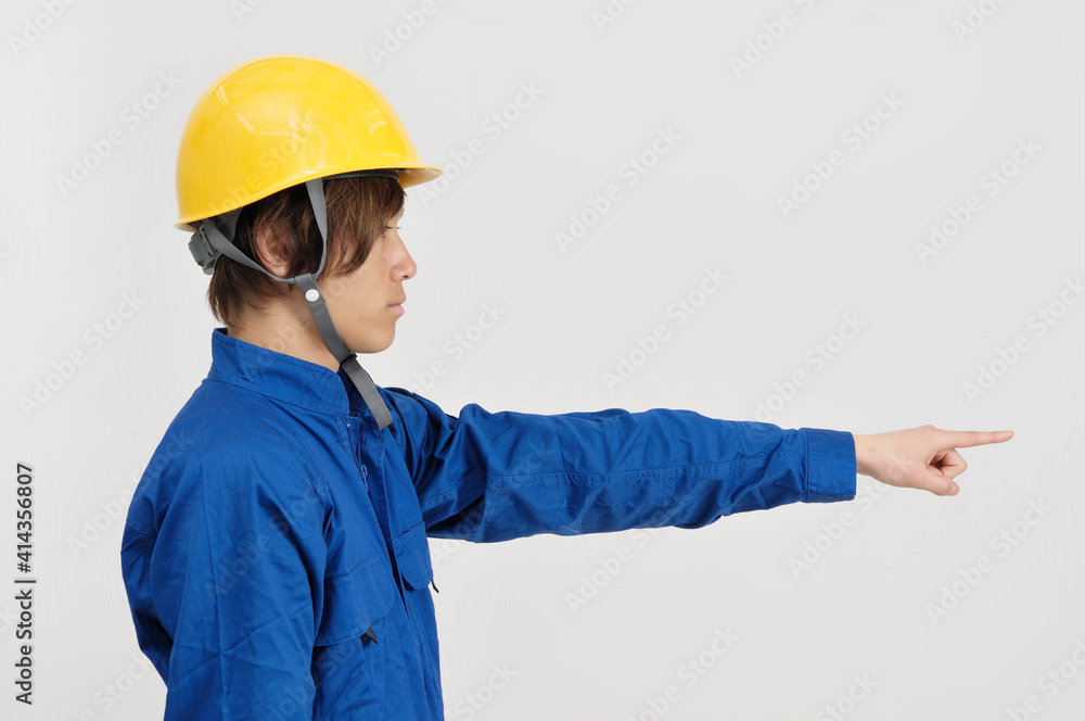 指さす土木作業員 指さす土木作業員