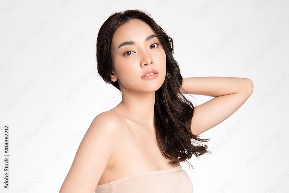 Beautiful young asian woman with clean fresh skin on white background, Face care, Facial treatment, Cosmetology, beauty and spa, Asian women portrait Beautiful young asian woman with clean fresh skin on white background, Face care, Facial treatment, Cosmetology, beauty and spa, Asian women portrait
