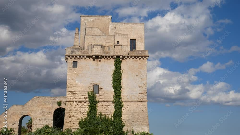 Picturesque historical fortification tower Torre Colimena on Salento Ionian sea coast, Taranto, Puglia, Italy Picturesque historical fortification tower Torre Colimena on Salento Ionian sea coast, Taranto, Puglia, Italy