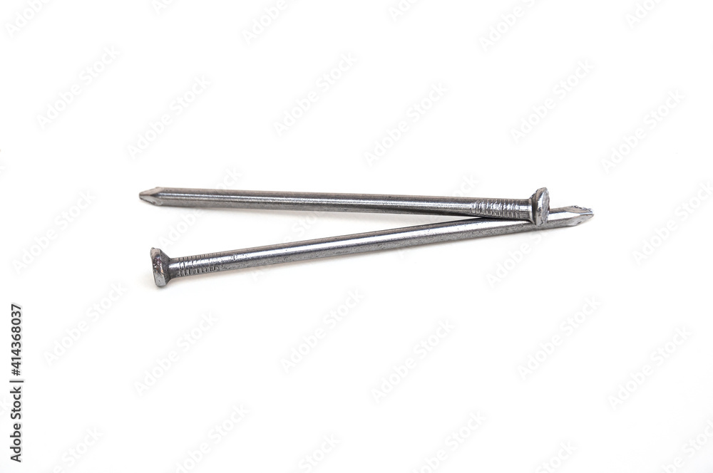 Steel nails 4-inch isolated on white background. Steel nails 4-inch isolated on white background.