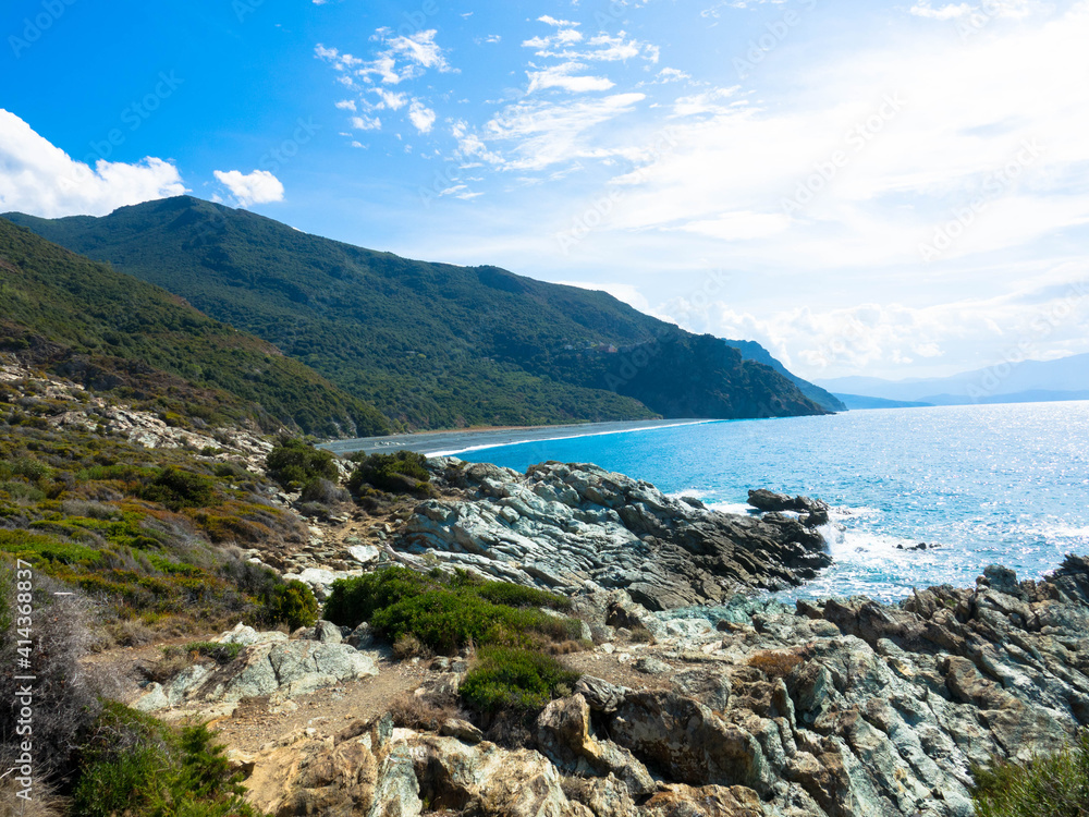 View of rocky coastline in the mediterranean sea near Nonza, Cap Corse, France