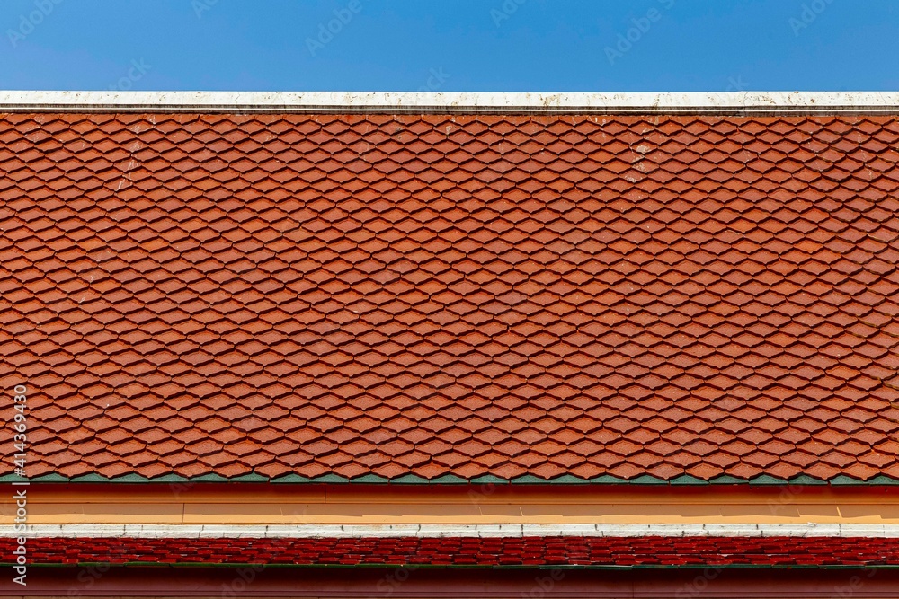 Naklejka premium Clay tile roof at Thai temple pattern and background seamless