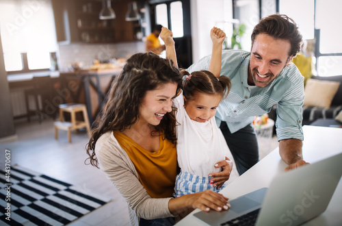 Fotografie Family, children, happiness technology and home concept