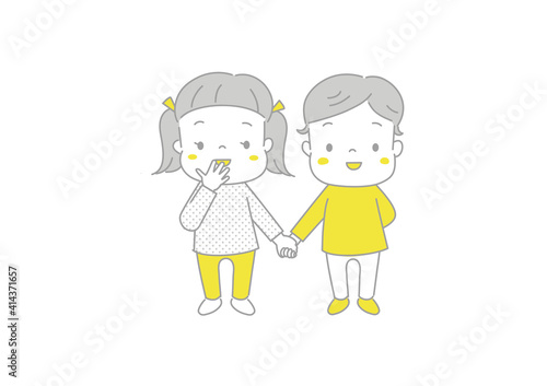手をつないで照れ笑いする子どもたち　笑顔の男の子と女の子