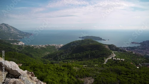 Panoramic view from the top of the mountain to the city of Budva, located on the shores of the Adriatic Sea MontenegroPanoramic view from the top of the mountain to the city of Budva, located on the s photo