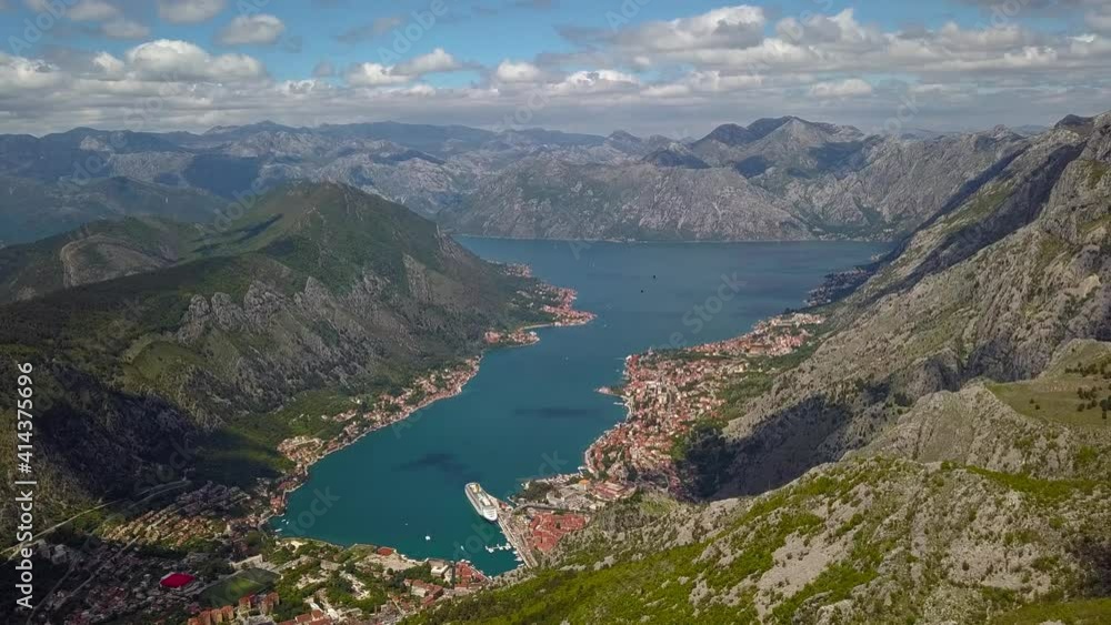 View from the very top of the mountain over the Bay of Kotor Montenegro. From here you can see the whole city of Kotor, the Adriatic Sea and the border with Croatia. Aerial view View from the very top of the mountain over the Bay of Kotor Montenegro. From here you can see the whole city of Kotor, the Adriatic Sea and the border with Croatia. Aerial view