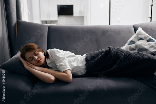 Quadro em tela woman with closed eyes resting lying on sofa cropped view close-up