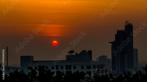 panoramic high-angle evening background of the city view,with natural beauty and blurred sunsets in the evening and the wind blowing all the time,showing the distribution of city center accommodation