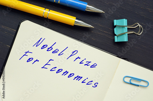 Business concept about Nobel Prize For Economics with sign on the page. photo