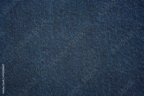 Denim blue jeans fabric. Denim background texture for design. Canvas denim. Blue jeans texture for any background.