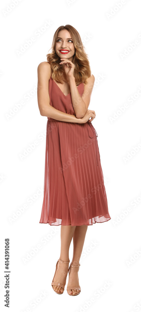 Happy young woman on white background. Christmas celebration