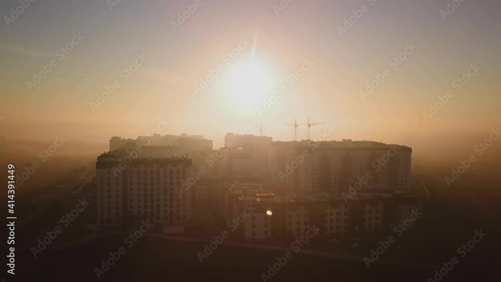 morning flight at dawn over the construction of houses, beautiful view morning flight at dawn over the construction of houses, beautiful view
