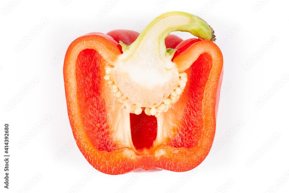 Half red pepper with seeds inside, top view Half red pepper with seeds inside, top view