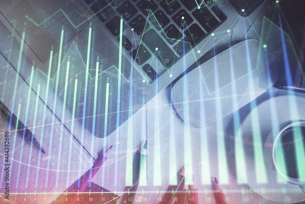 Double exposure of financial chart drawing over table background with computer. Concept of research and analysis. Top view.