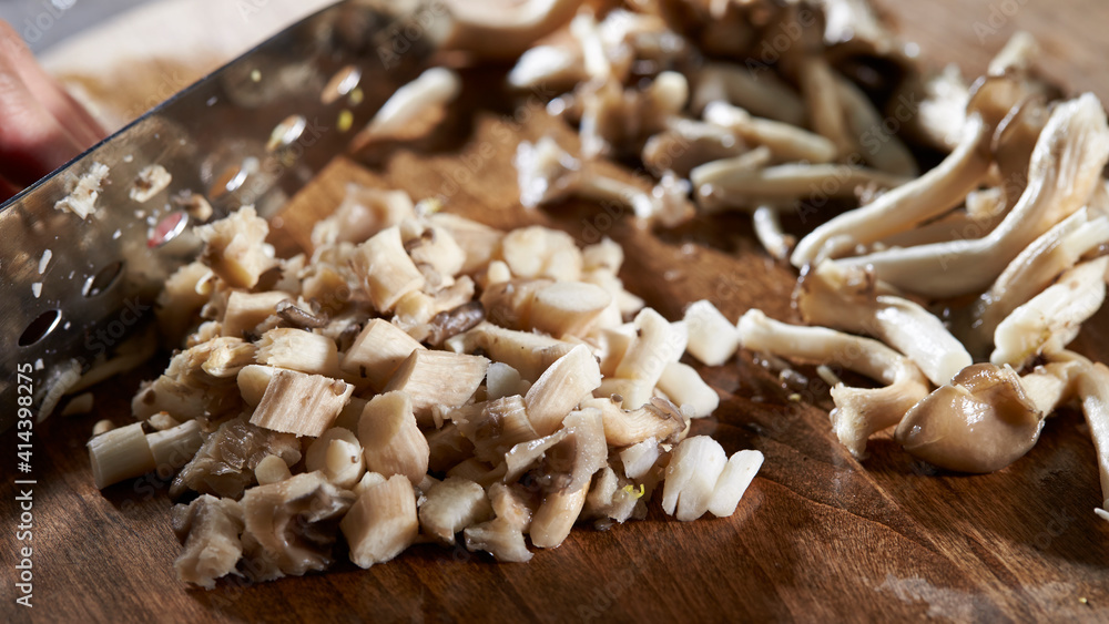Cook chopped mushrooms on the board Cook chopped mushrooms on the board