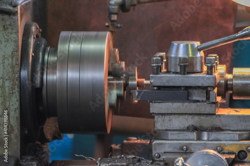 The turning chuck of the Soviet machine tool in motion close-up