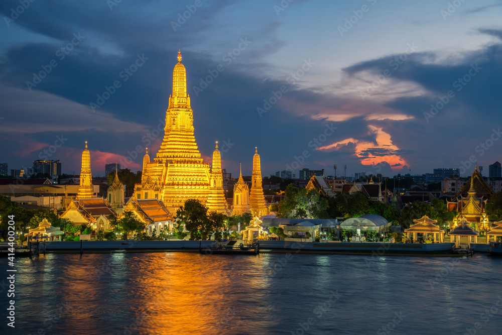 Wat Arun Temple at sunset in bangkok Thailand. Wat Arun is a Buddhist temple in Bangkok Yai district of Bangkok, Thailand, Wat Arun is among the best known of Thailand's landmarks Wat Arun Temple at sunset in bangkok Thailand. Wat Arun is a Buddhist temple in Bangkok Yai district of Bangkok, Thailand, Wat Arun is among the best known of Thailand's landmarks