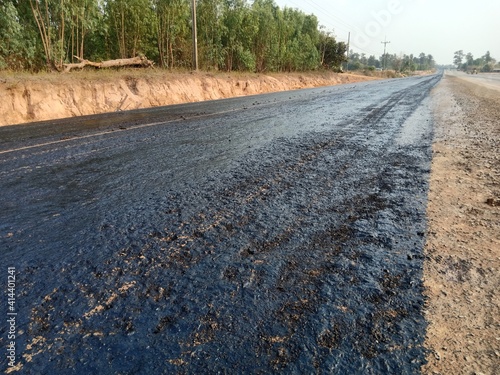 Tire spraying for road construction