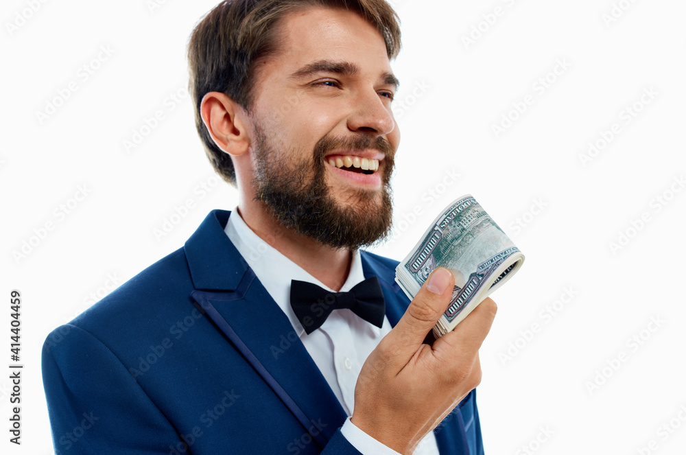 happy man with bundle of money and in classic suit on white background cropped view happy man with bundle of money and in classic suit on white background cropped view