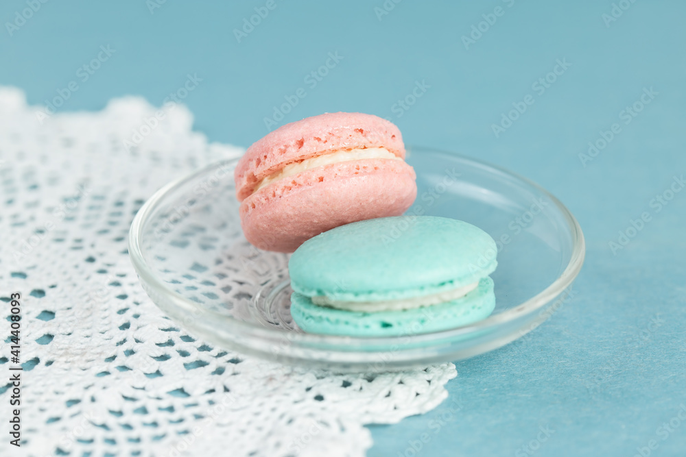Colorful macarons on a blue background Colorful macarons on a blue background