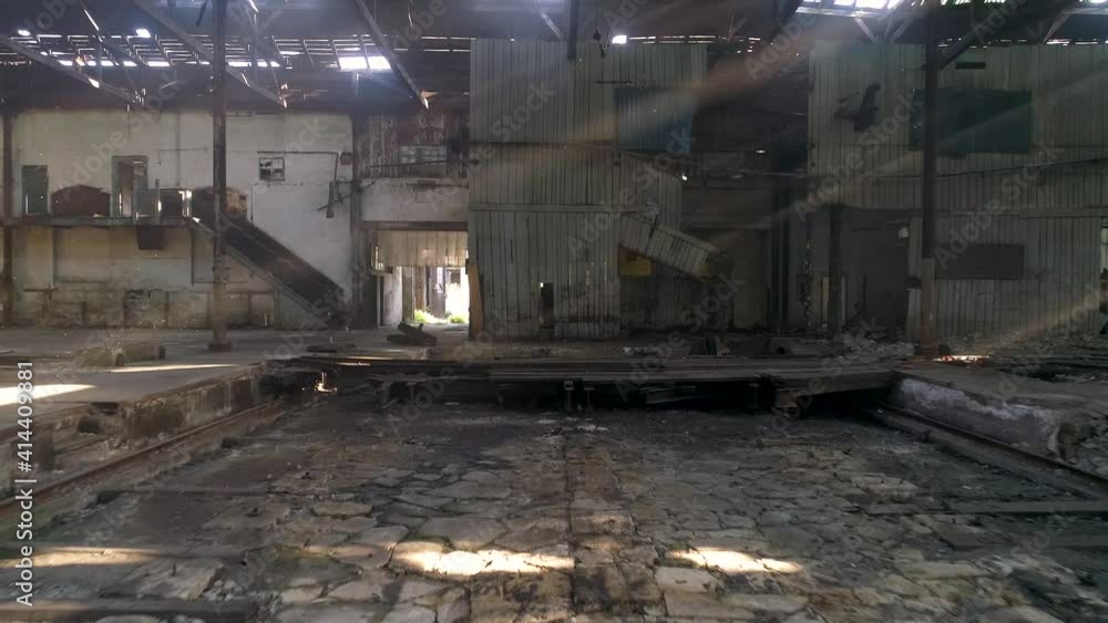 Image of sun rays crossing a scenic abandoned warehouse Image of sun rays crossing a scenic abandoned warehouse