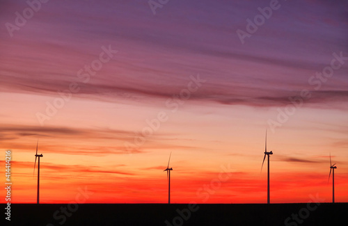 Wind turbines at sunset landscape