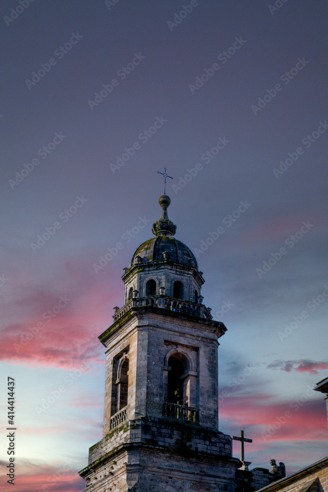 A tower in a cloudly sunset.