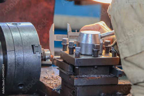 The main parts of the lathe are close-up. Turning chuck and tool holder photo