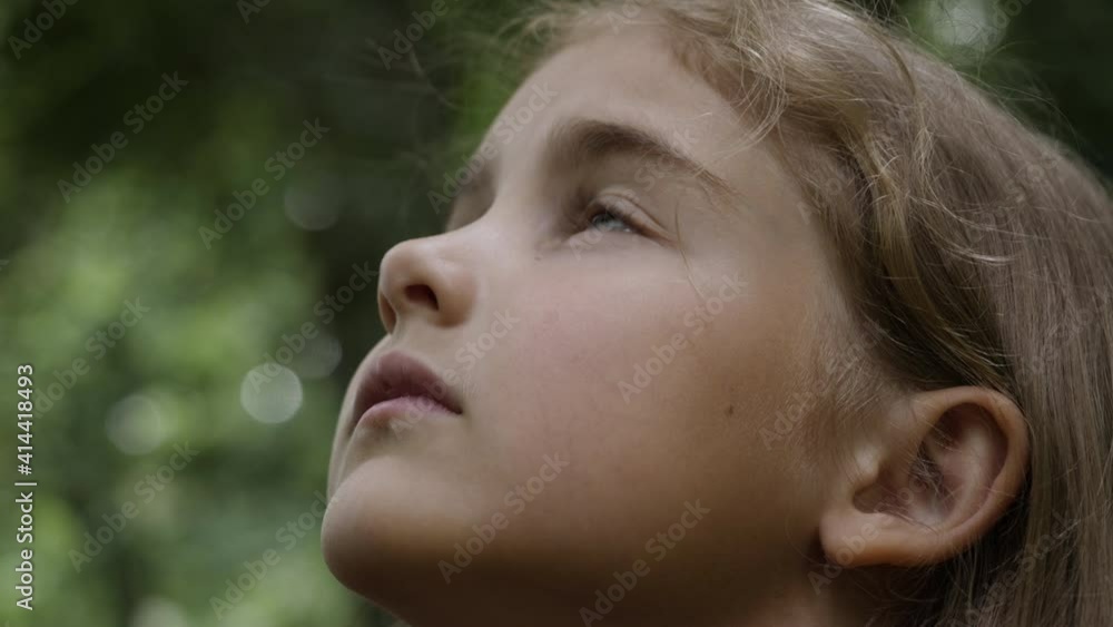 Kid Looking Up at Sky in Nature. Portrait Little Girl Praying Looking Up at Sky With Hope and Faith, Contemplative Child Face, Closeup. Girl Looks-up God Believer Prayer, Passionate Dreamer Divine. Kid Looking Up at Sky in Nature. Portrait Little Girl Praying Looking Up at Sky With Hope and Faith, Contemplative Child Face, Closeup. Girl Looks-up God Believer Prayer, Passionate Dreamer Divine.