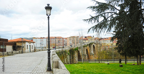 Puente medieval Puente romano Camino de Santiago camino sanabrés en Ourense Orense Galicia España photo
