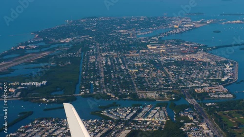 Key West seen from an airplane window while I flew away on a warm sunny spring day. photo