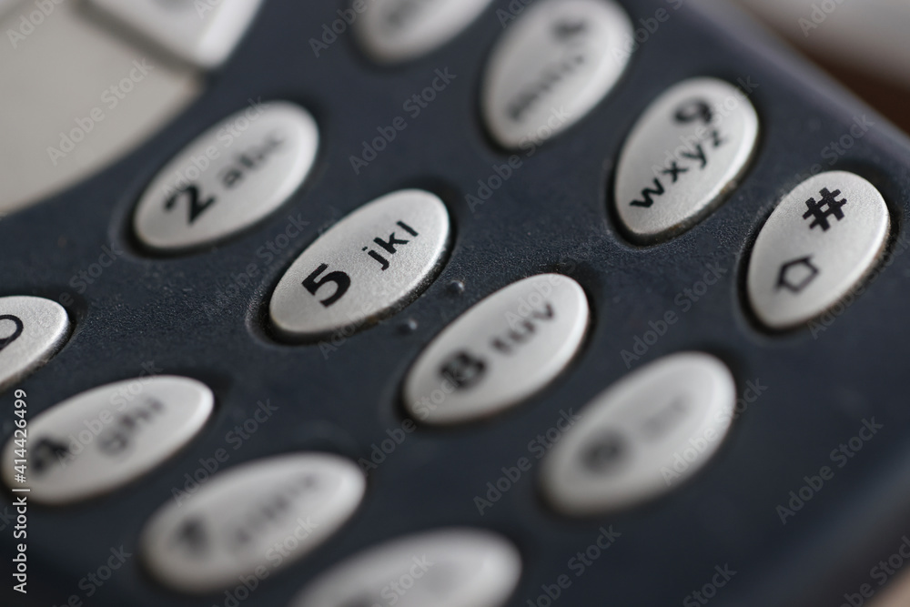Closeup of buttons on mobile phone keyboard. Phone repair concept Closeup of buttons on mobile phone keyboard. Phone repair concept