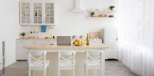 Minimalist dining room interior and stylish kitchen, rent, ad and sale of flat © Prostock-studio