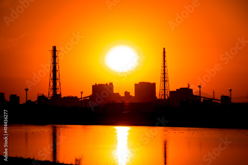 oil refinery at sunset