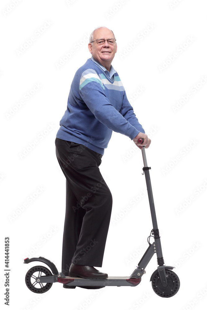 side view. happy senior man with electric scooter side view. happy senior man with electric scooter