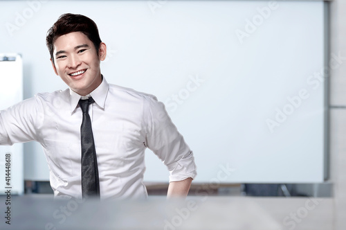 Asian businessman standing
