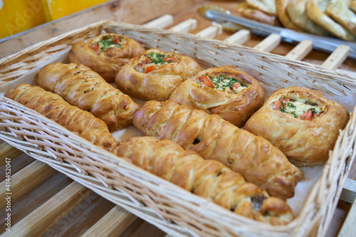 Freshly baked homemade savory puff pastries patties, rollini photo