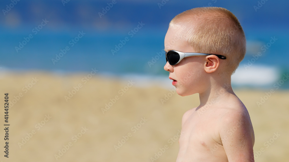 Little boy playing on the beach Little boy playing on the beach