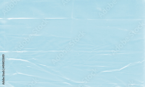 vivid Background texture of a polyethylene,plastic transparent black plastic film,transparent stretched background  © designbydi