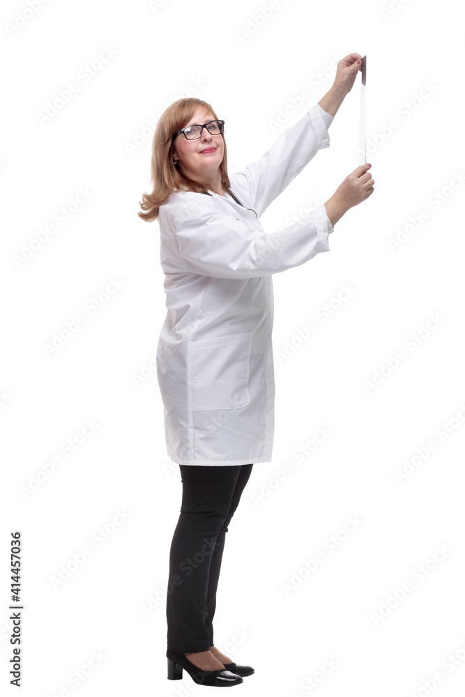 therapist carefully looking at the x- ray . isolated on a white therapist carefully looking at the x- ray . isolated on a white