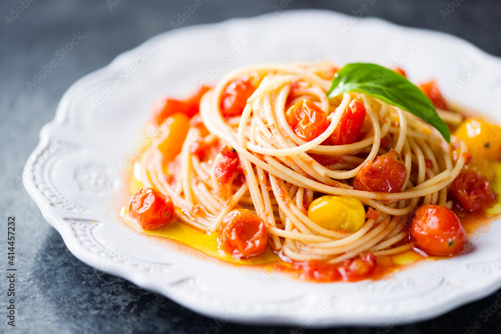 rustic italian cherry tomato spaghetti pasta blur defocused