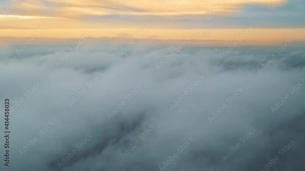 Aerial drone view above the clouds with buildings visible through, Chisinau, Moldova Aerial drone view above the clouds with buildings visible through, Chisinau, Moldova