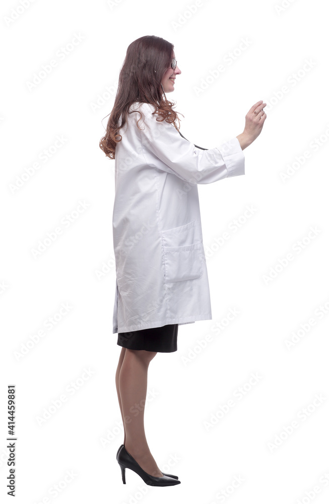 side view. female doctor using her stethoscope side view. female doctor using her stethoscope