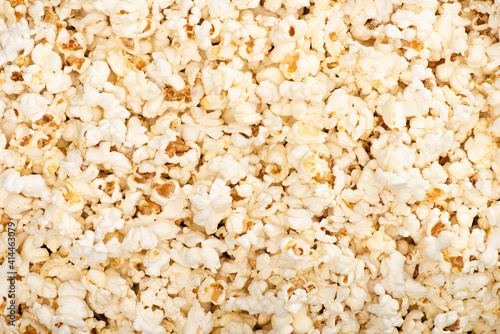 background with airy popcorn, top view, cinema concept