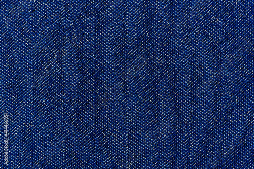 Denim blue jeans fabric with lurex. Denim background texture for design. Canvas denim. Blue jeans texture for any background.