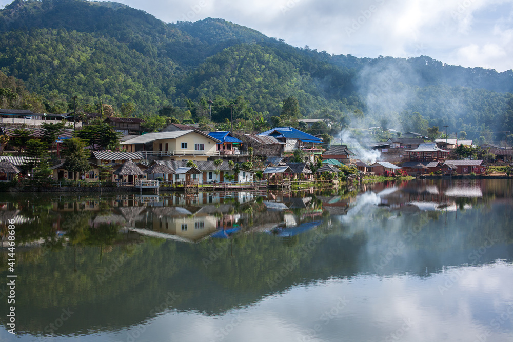 Ban Rak Thai, A highland village set in a valley surrounded by hills and tea plantations on the edge of a reservoir in Mea Hong Son Province, Thailand