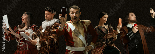 Modern tech devices. Medieval people as a royalty persons in vintage clothing on dark background. Concept of comparison of eras, modernity and renaissance, baroque style. Creative collage. Flyer