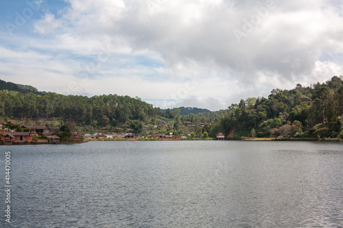 Ban Rak Thai, A highland village set in a valley surrounded by hills and tea plantations on the edge of a reservoir in Mea Hong Son Province, Thailand